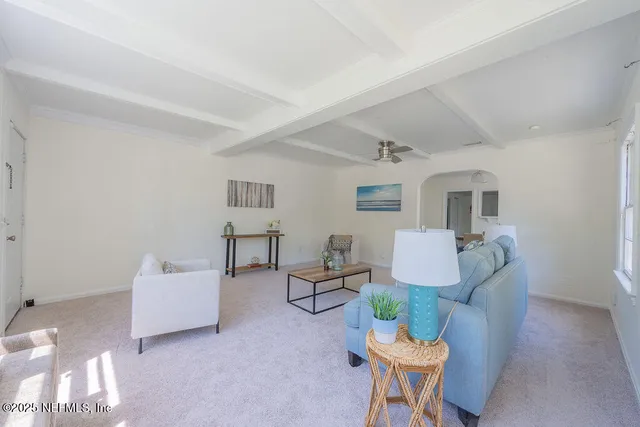 a dining room with a table and chairs