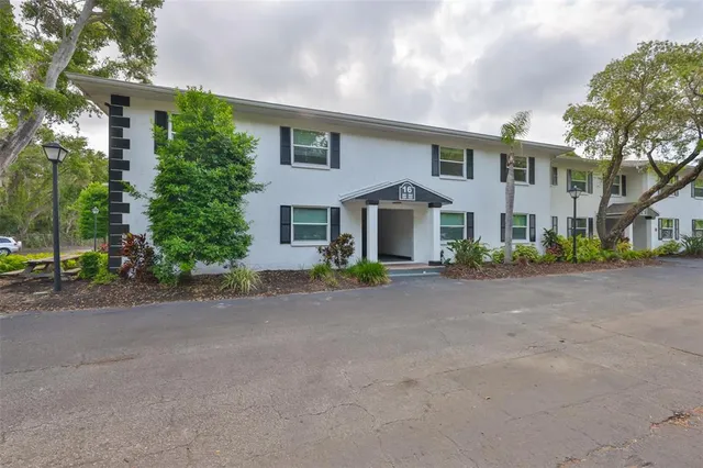 a view of a house with a street