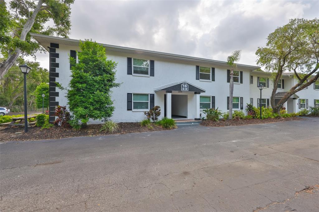 a view of a house with a street