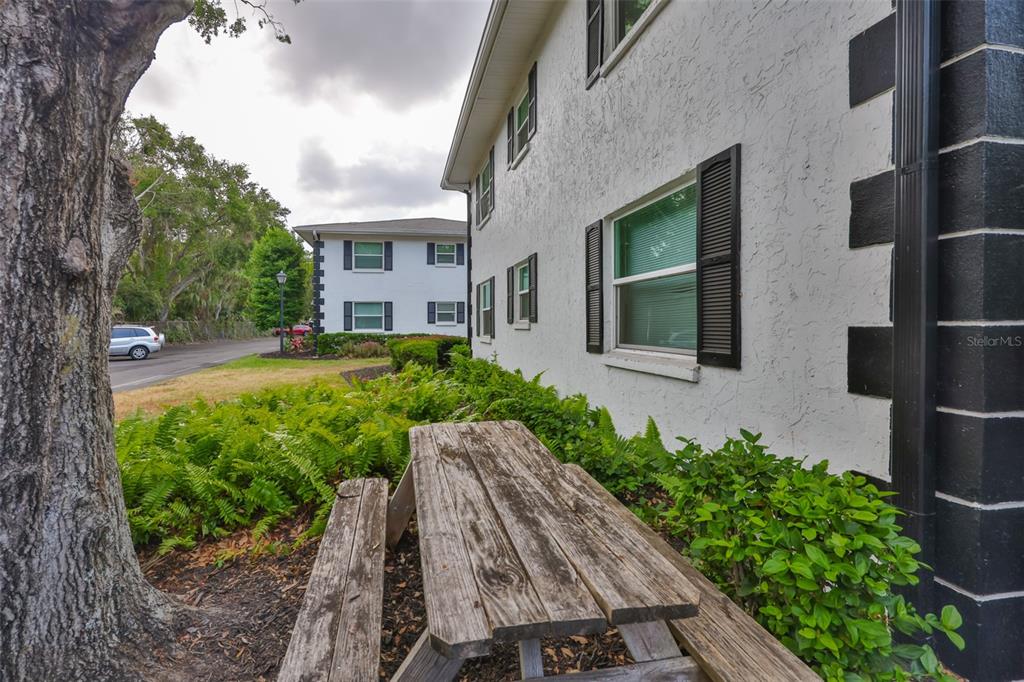 13125 Wilcox Road, Unit 16202 Largo, FL 33774 - Photo 24 of 37 a view of a house with a yard