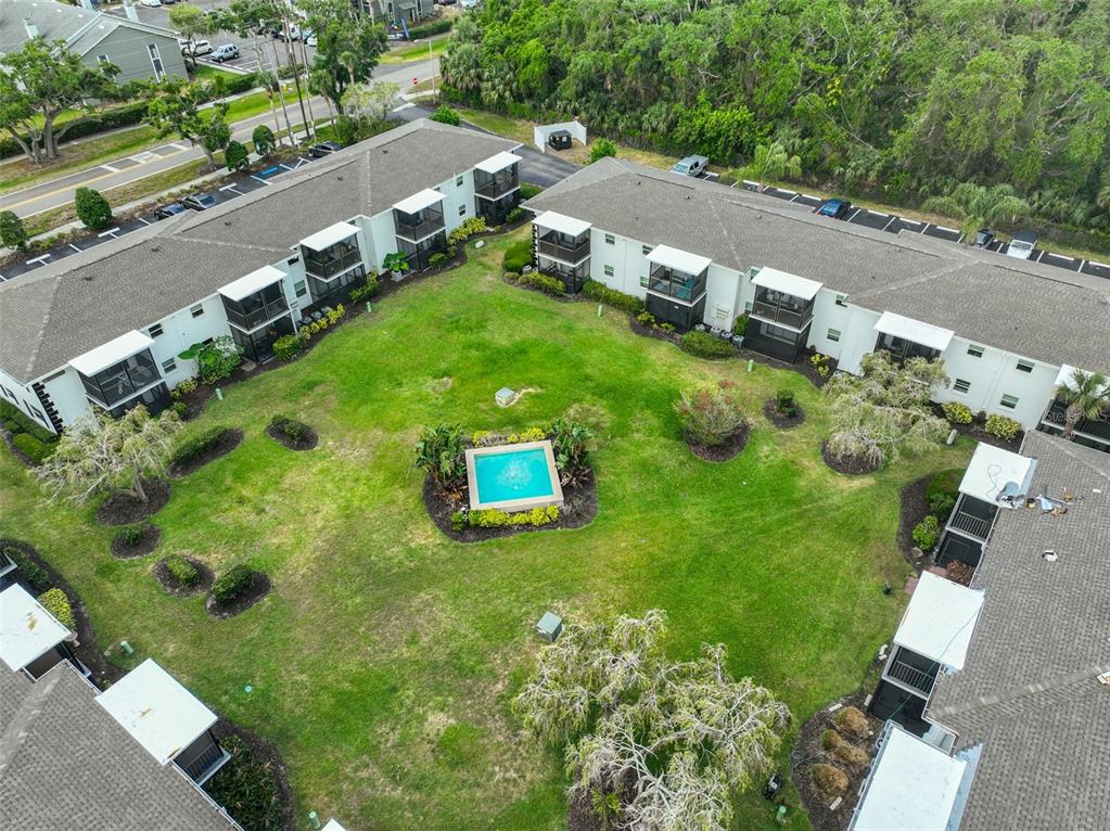 13125 Wilcox Road, Unit 16202 Largo, FL 33774 - Photo 26 of 37 an aerial view of a house with yard