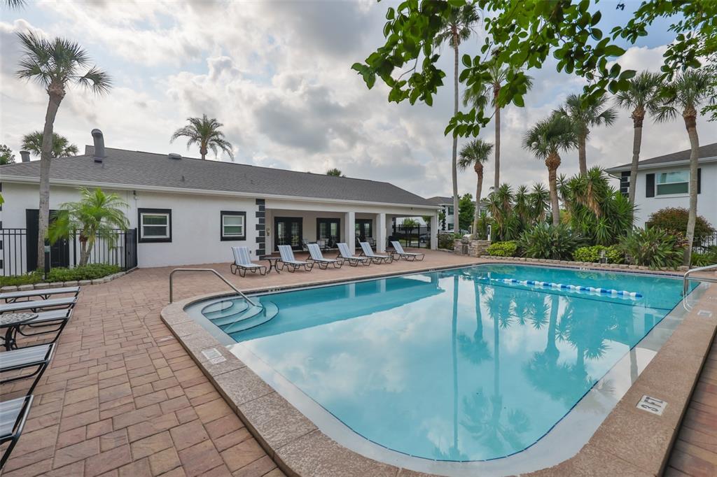 13125 Wilcox Road, Unit 16202 Largo, FL 33774 - Photo 4 of 37 a view of a house with swimming pool