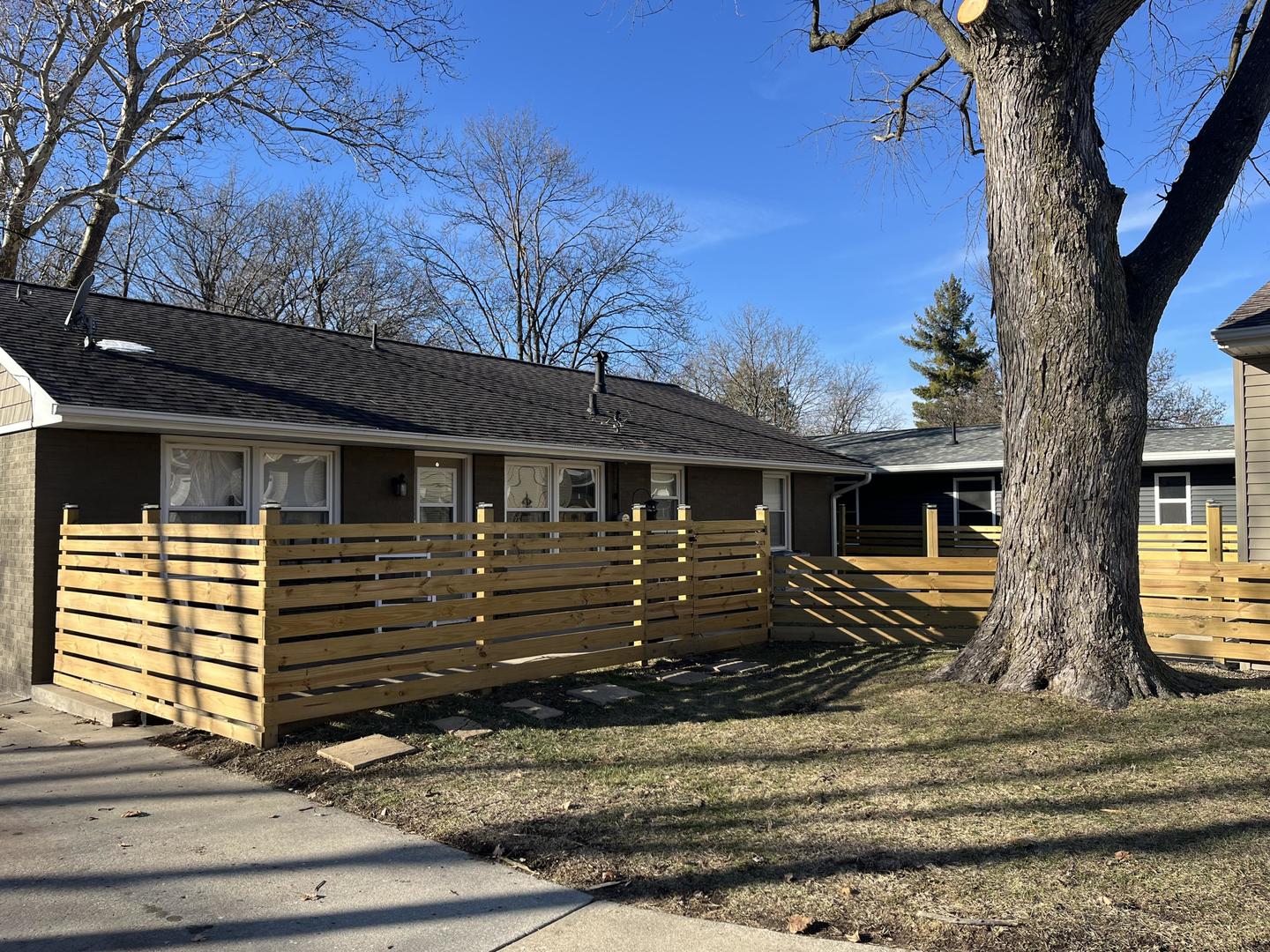 1014 Franklin Avenue Normal, IL 61761 - Photo 2 of 6 a front view of a house with a yard