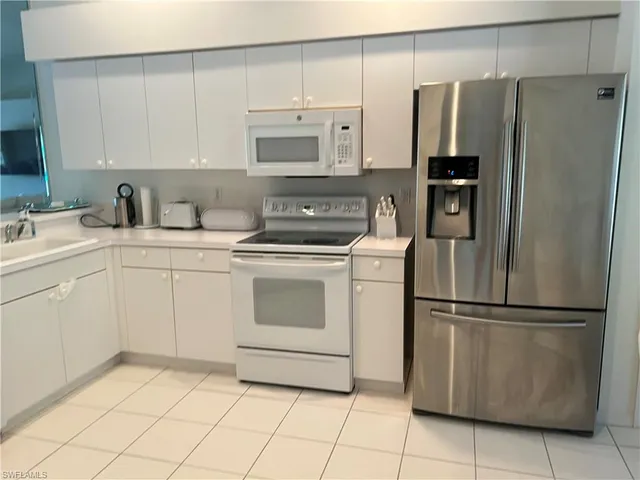 $470,000 | 8400 Naples Heritage Drive, Unit 1521, Naples, FL 34112