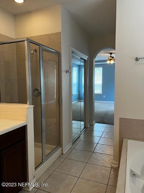3121 East Banister Road St. Augustine, FL 32092 - Photo 15 of 31 a bathroom with a glass door shower