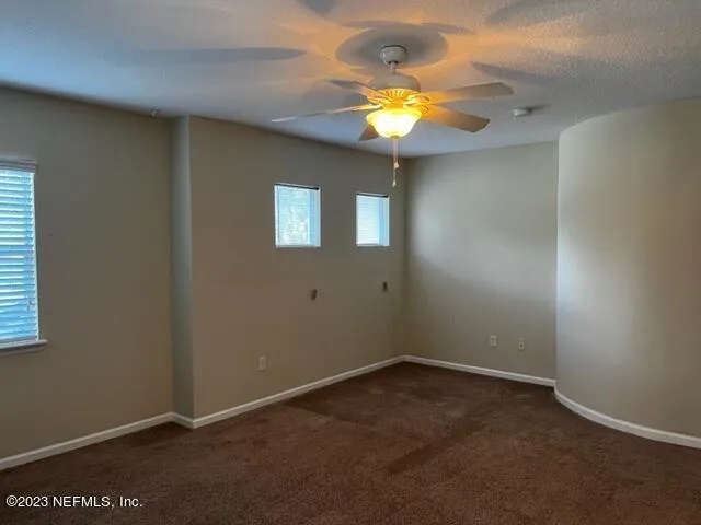 a bathroom with a double vanity sink and mirror