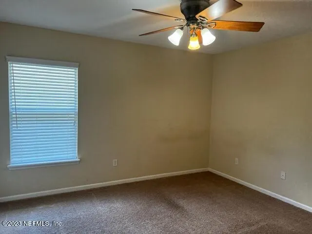 a bathroom with a sink and a shower