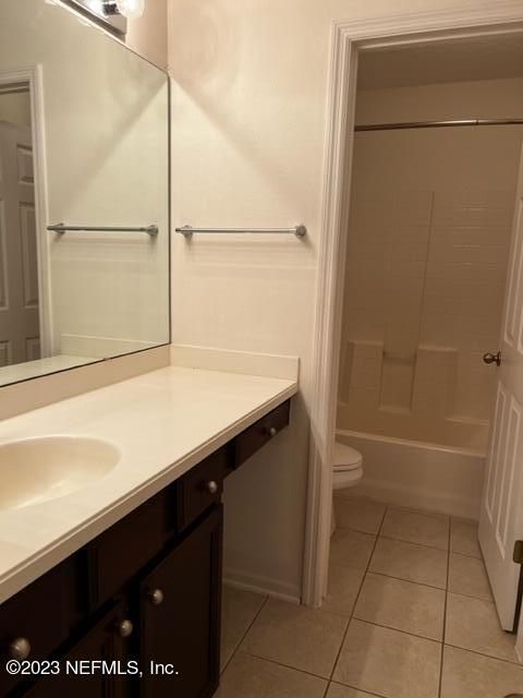 3121 East Banister Road St. Augustine, FL 32092 - Photo 27 of 31 a bathroom with a sink and a shower