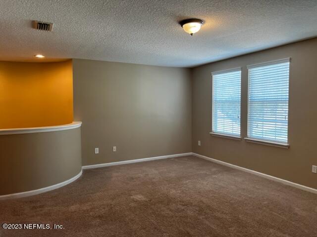 3121 East Banister Road St. Augustine, FL 32092 - Photo 28 of 31 a view of an empty room with a window