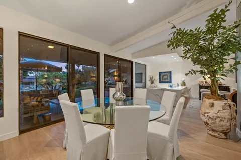 a view of living room with furniture and flat screen tv