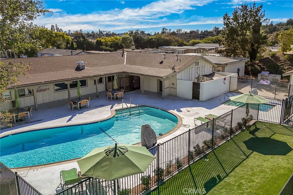 1120 East Mission Road, Unit 79 Fallbrook, CA 92028 - Photo 36 of 43 a view of a patio with couches table and chairs