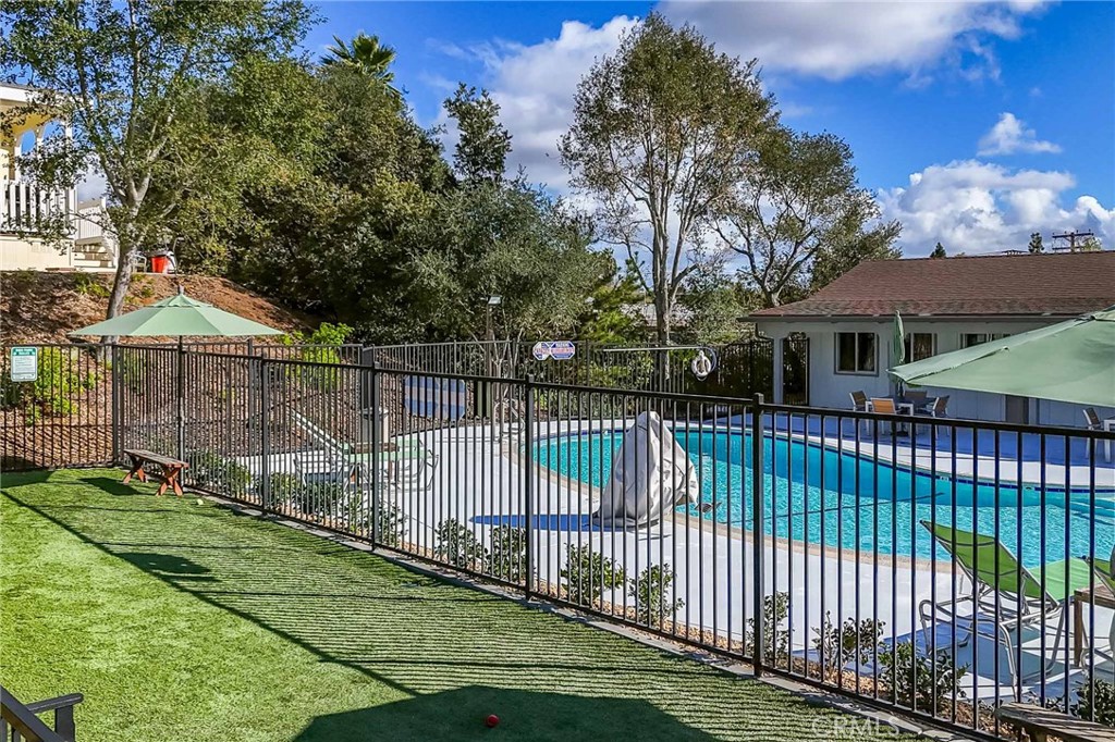 1120 East Mission Road, Unit 79 Fallbrook, CA 92028 - Photo 40 of 43 a view of a wrought iron fences in front of a house
