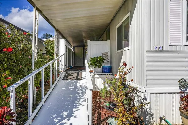 a view of balcony and wooden door
