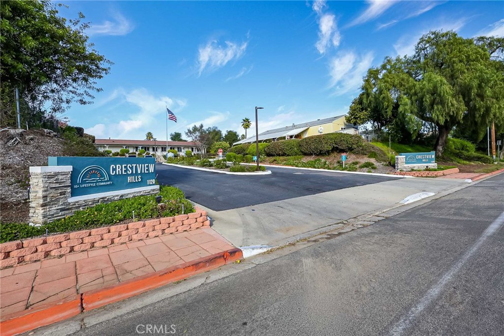 1120 East Mission Road, Unit 79 Fallbrook, CA 92028 - Photo 41 of 43 a view of a street with a building in the background