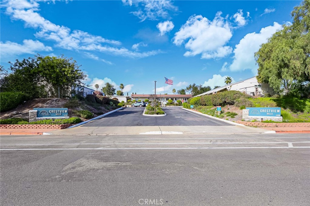 1120 East Mission Road, Unit 79 Fallbrook, CA 92028 - Photo 42 of 43 a view of a street with houses