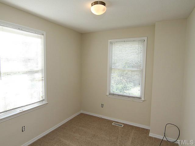 715 Edmund Street Raleigh, NC 27604 - Photo 10 of 13 a view of an empty room with a window