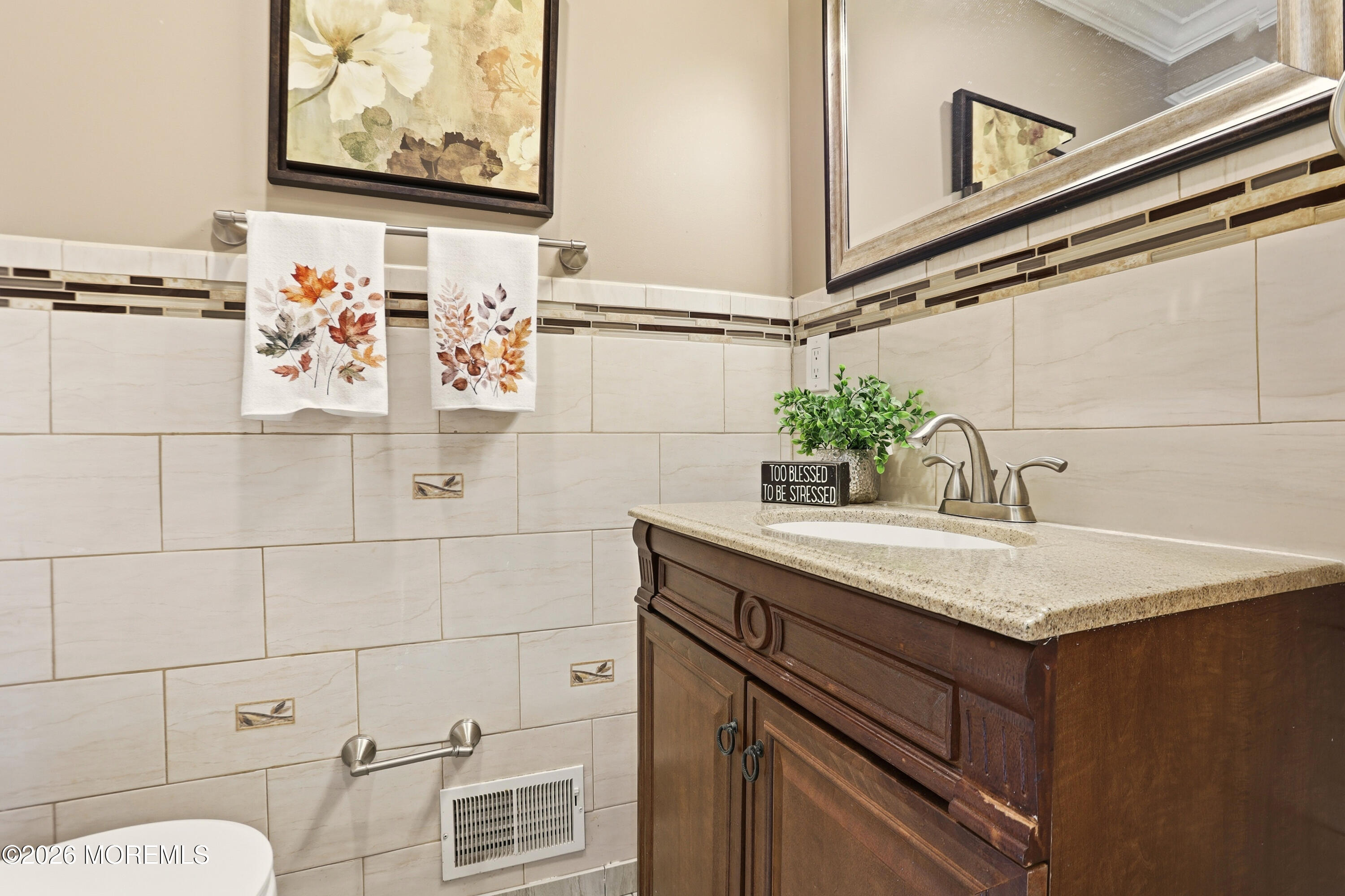 1991 Ridgeway Road Toms River, NJ 08757 - Photo 19 of 46 a bathroom with a sink and vanity