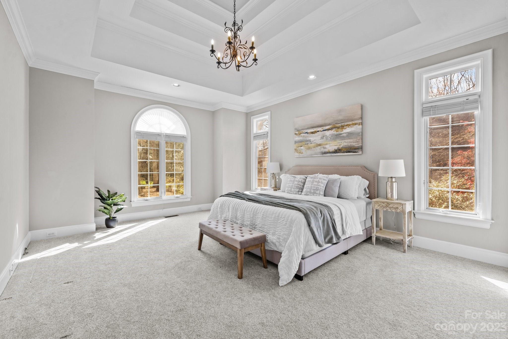 4732 Old Course Drive Charlotte, NC 28277 - Photo 13 of 48 a spacious bedroom with a bed and a large window