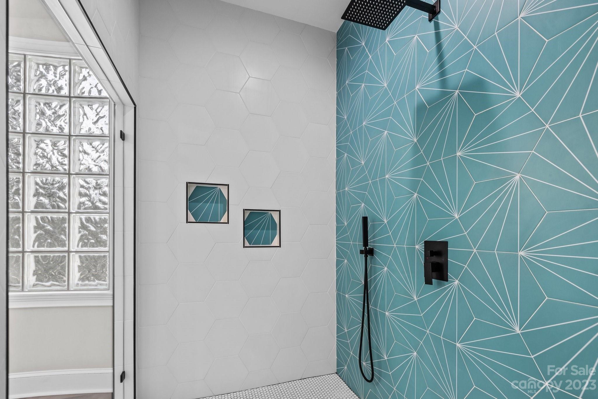 4732 Old Course Drive Charlotte, NC 28277 - Photo 17 of 48 a bathroom with a shower and a mirror