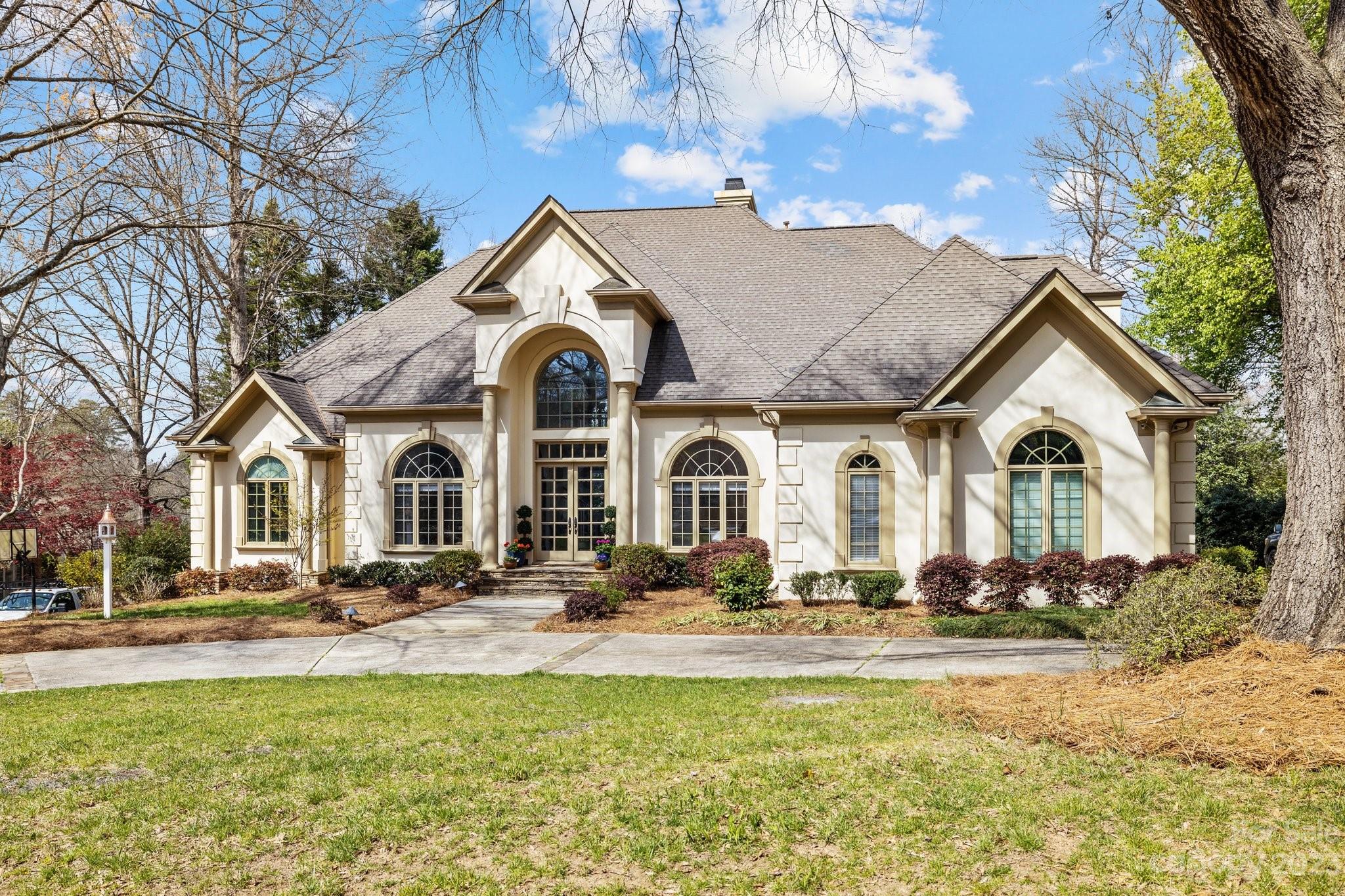 4732 Old Course Drive Charlotte, NC 28277 - Photo 2 of 48 a front view of a house with a yard