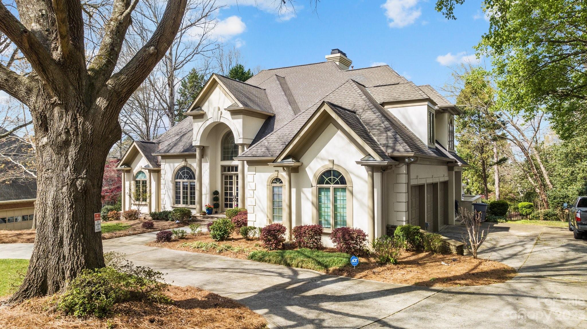 4732 Old Course Drive Charlotte, NC 28277 - Photo 3 of 48 a front view of a house with a yard
