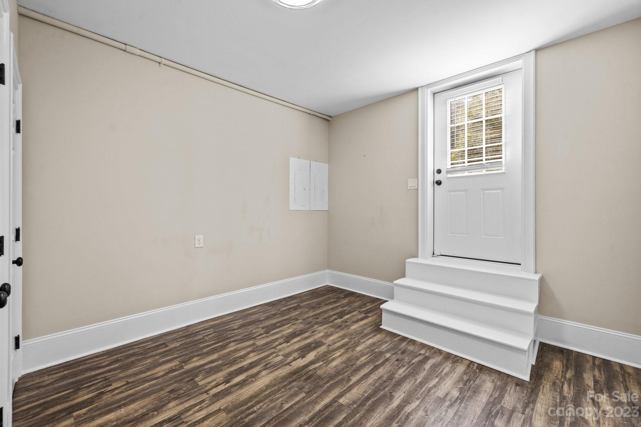 4732 Old Course Drive Charlotte, NC 28277 - Photo 40 of 48 a view of wooden floor and windows in a room
