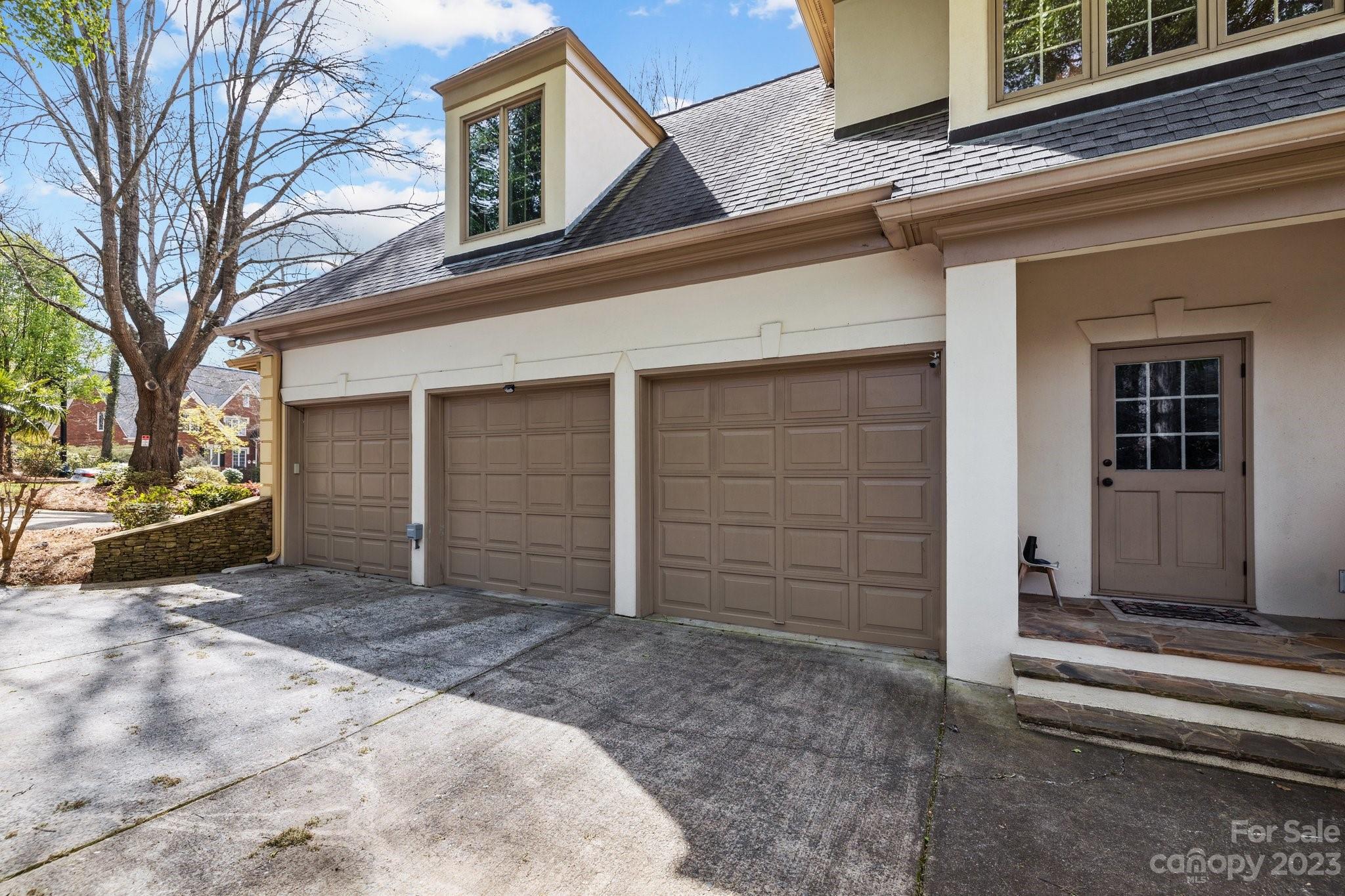 4732 Old Course Drive Charlotte, NC 28277 - Photo 43 of 48 a view of a house with a door and wooden walls