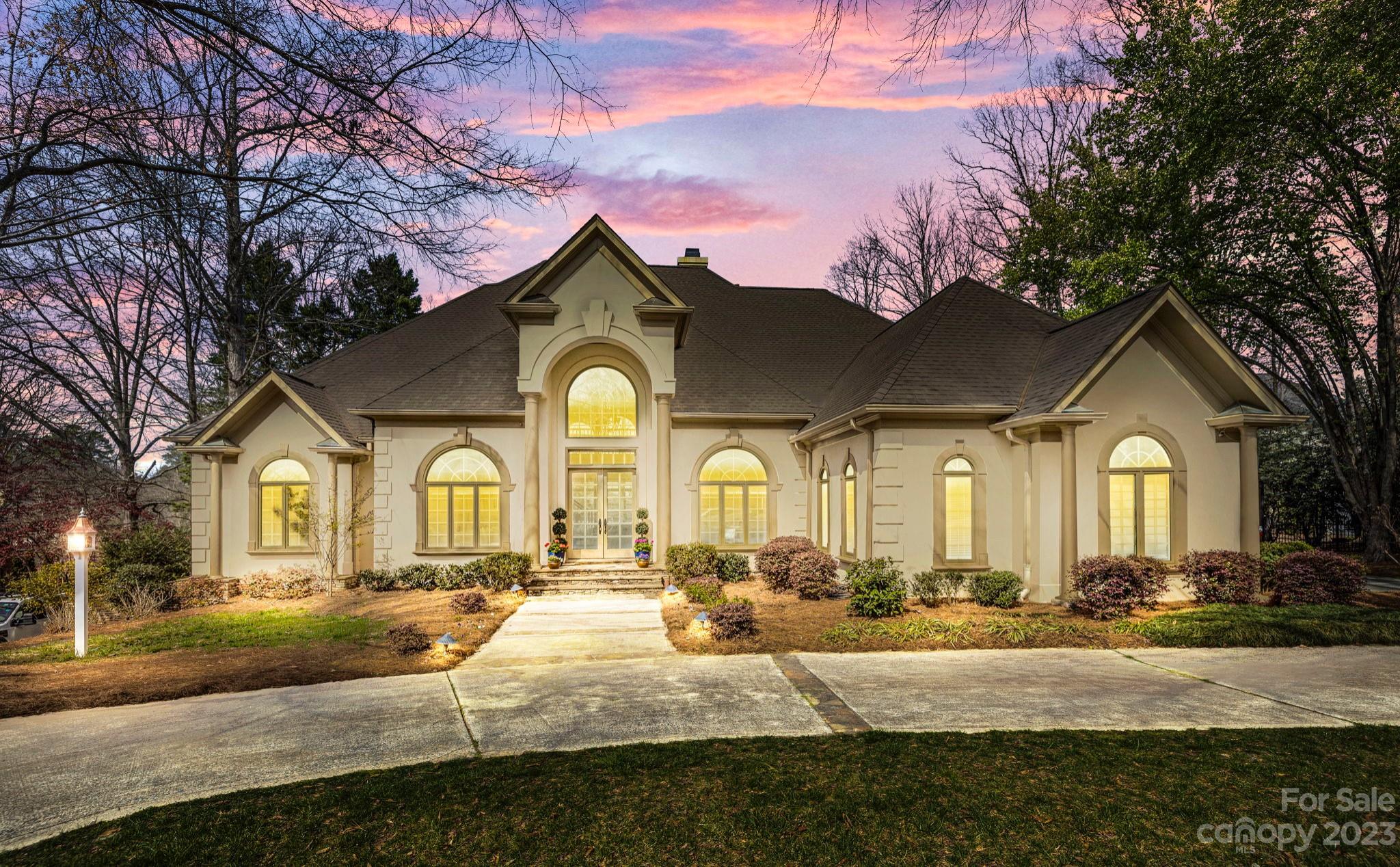 4732 Old Course Drive Charlotte, NC 28277 - Photo 47 of 48 a front view of a house with a yard