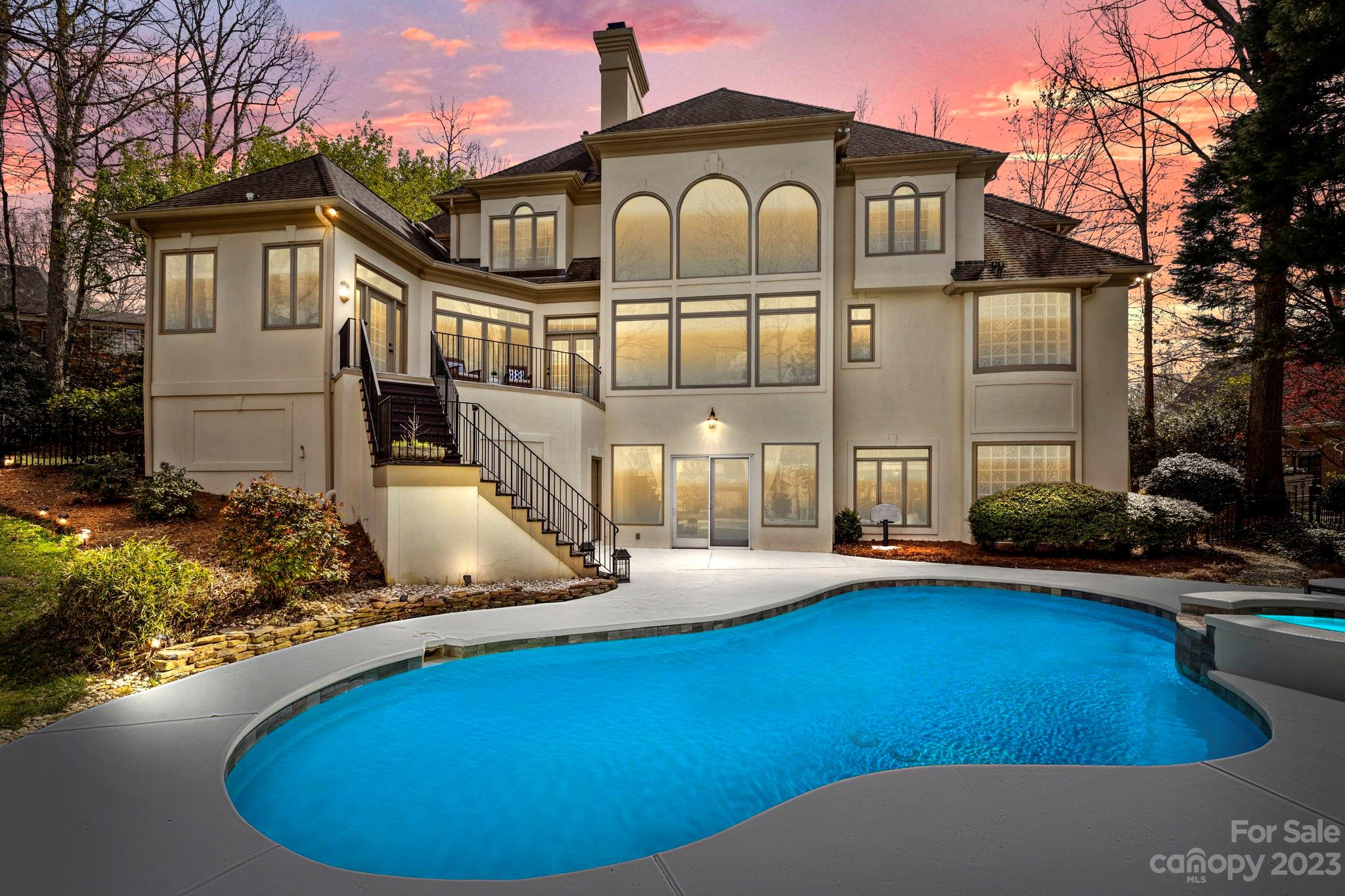 4732 Old Course Drive Charlotte, NC 28277 - Photo 48 of 48 a front view of a house with swimming pool