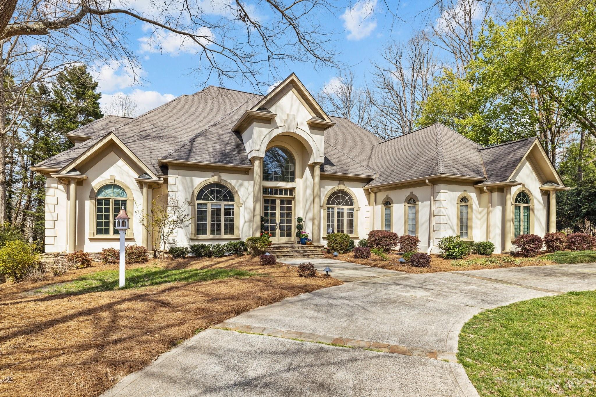 4732 Old Course Drive Charlotte, NC 28277 - Photo 6 of 48 a front view of a house with a yard