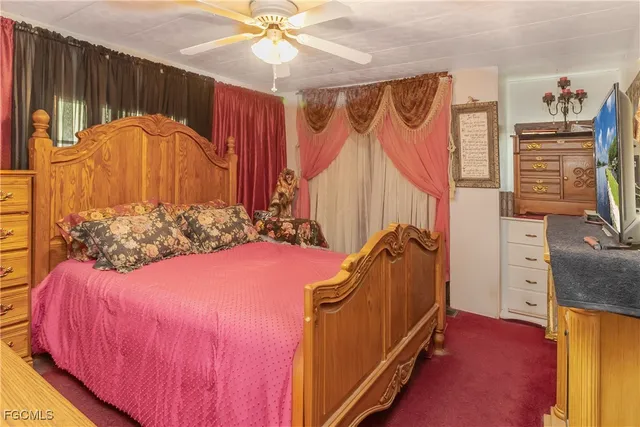 a bedroom with a bed and a closet