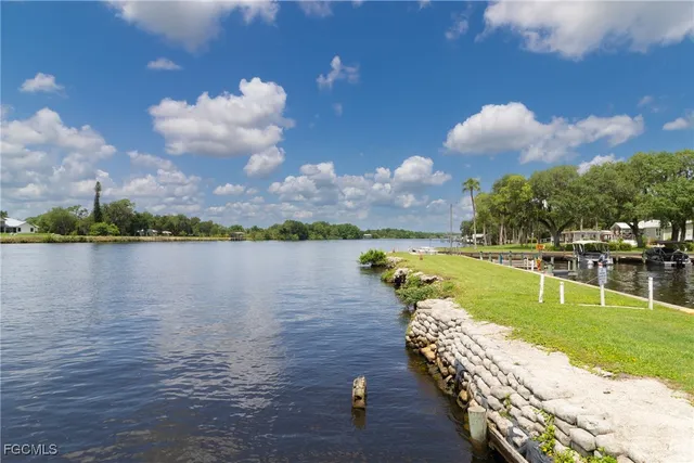 a view of a lake with a big yard