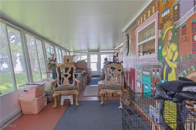 a view of a chairs and tables in balcony