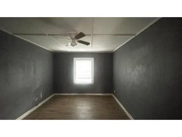 a black and white photo of a living room