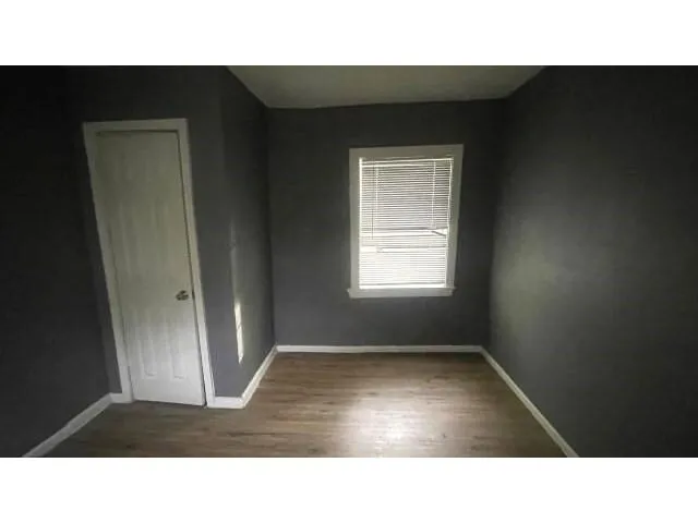 a black and white photo of a living room