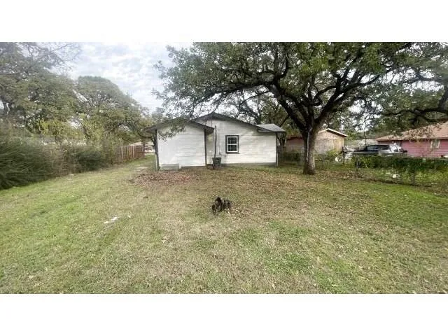 a black and white photo of a house