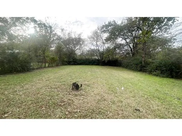 a black and white photo of a field