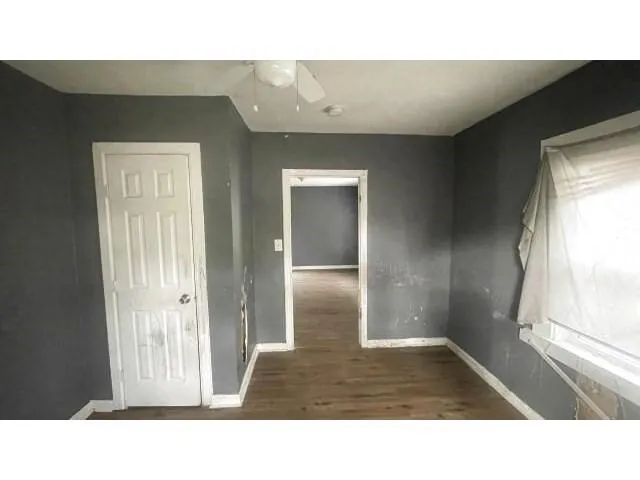 a bathroom with a sink and a large mirror