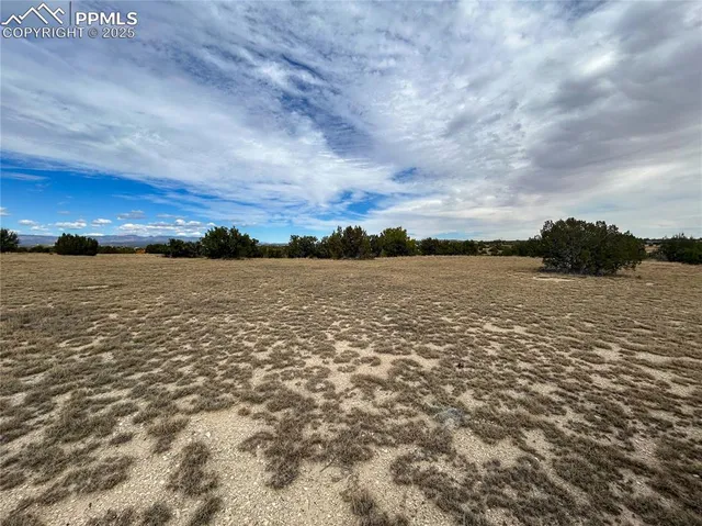 a view of lake with green space