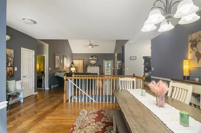 a view of a living room and dining room