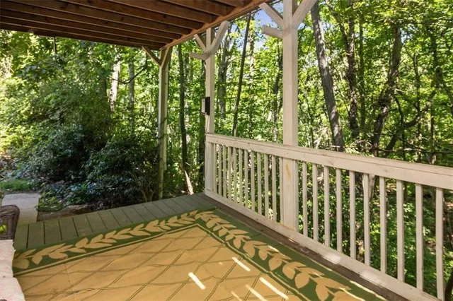 a view of a two chairs in the balcony