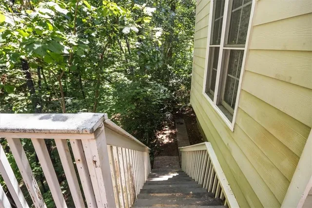 a view of a house with a tree