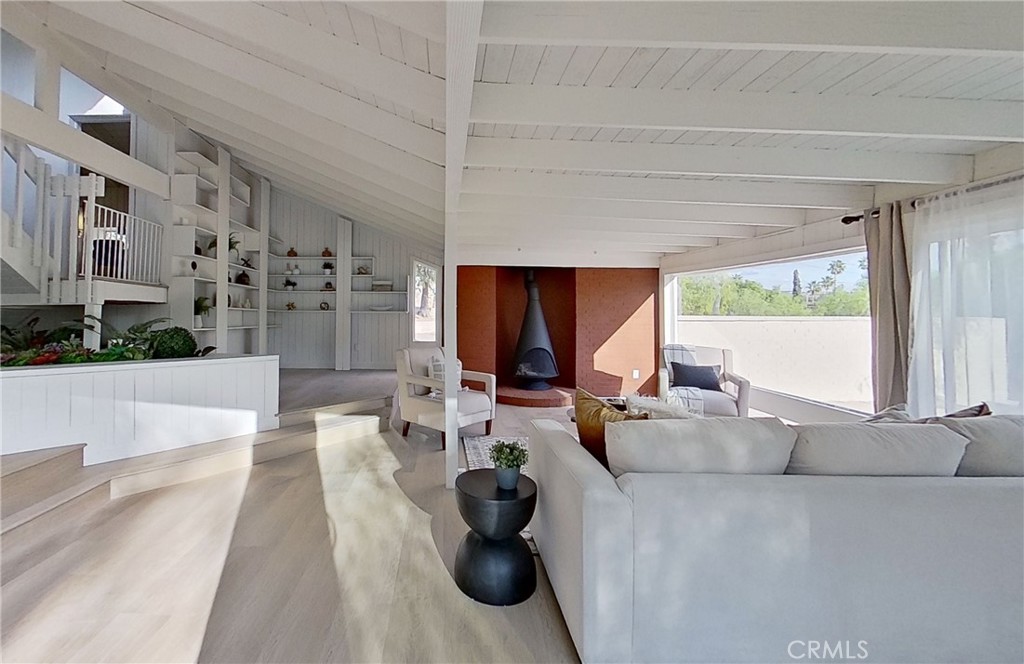 2390 Prenda Avenue Riverside, CA 92504 - Photo 11 of 21 a living room with furniture and a large window