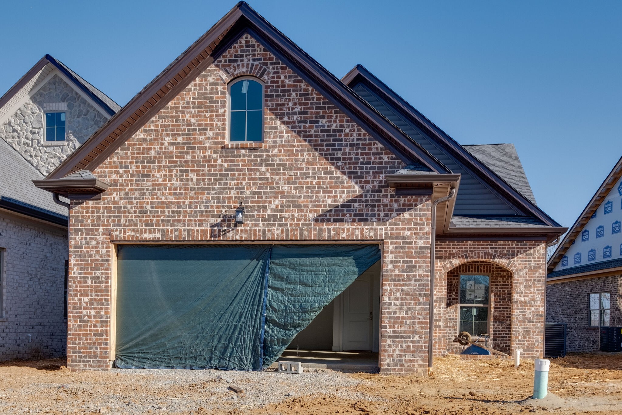 7 The Greens Springfield, TN 37172 - Photo 1 of 29 a front view of a house with glass windows