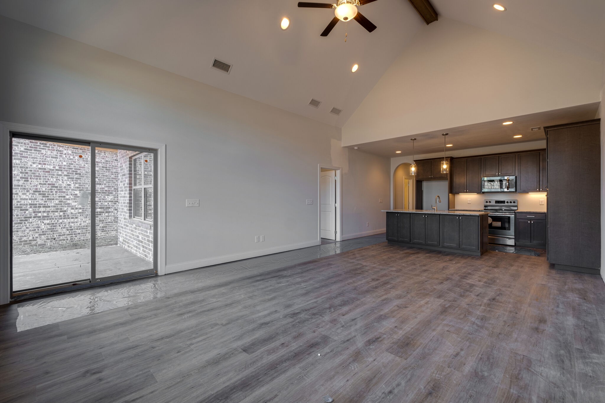 7 The Greens Springfield, TN 37172 - Photo 12 of 29 an empty room with wooden floor and windows