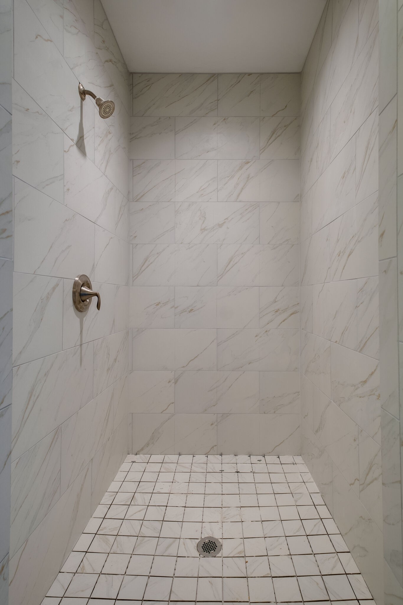7 The Greens Springfield, TN 37172 - Photo 16 of 29 a bathroom with a shower