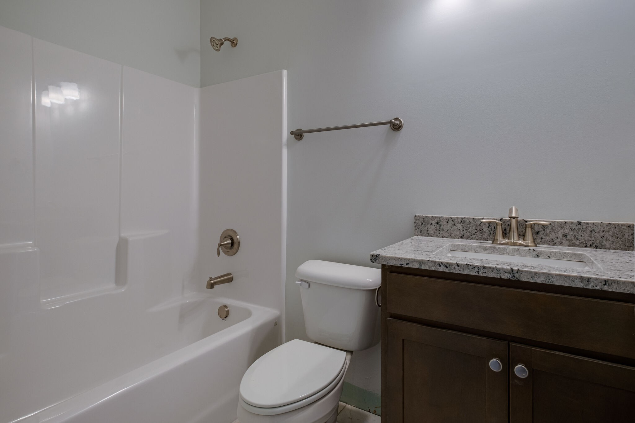 7 The Greens Springfield, TN 37172 - Photo 20 of 29 a bathroom with a granite countertop sink toilet and shower