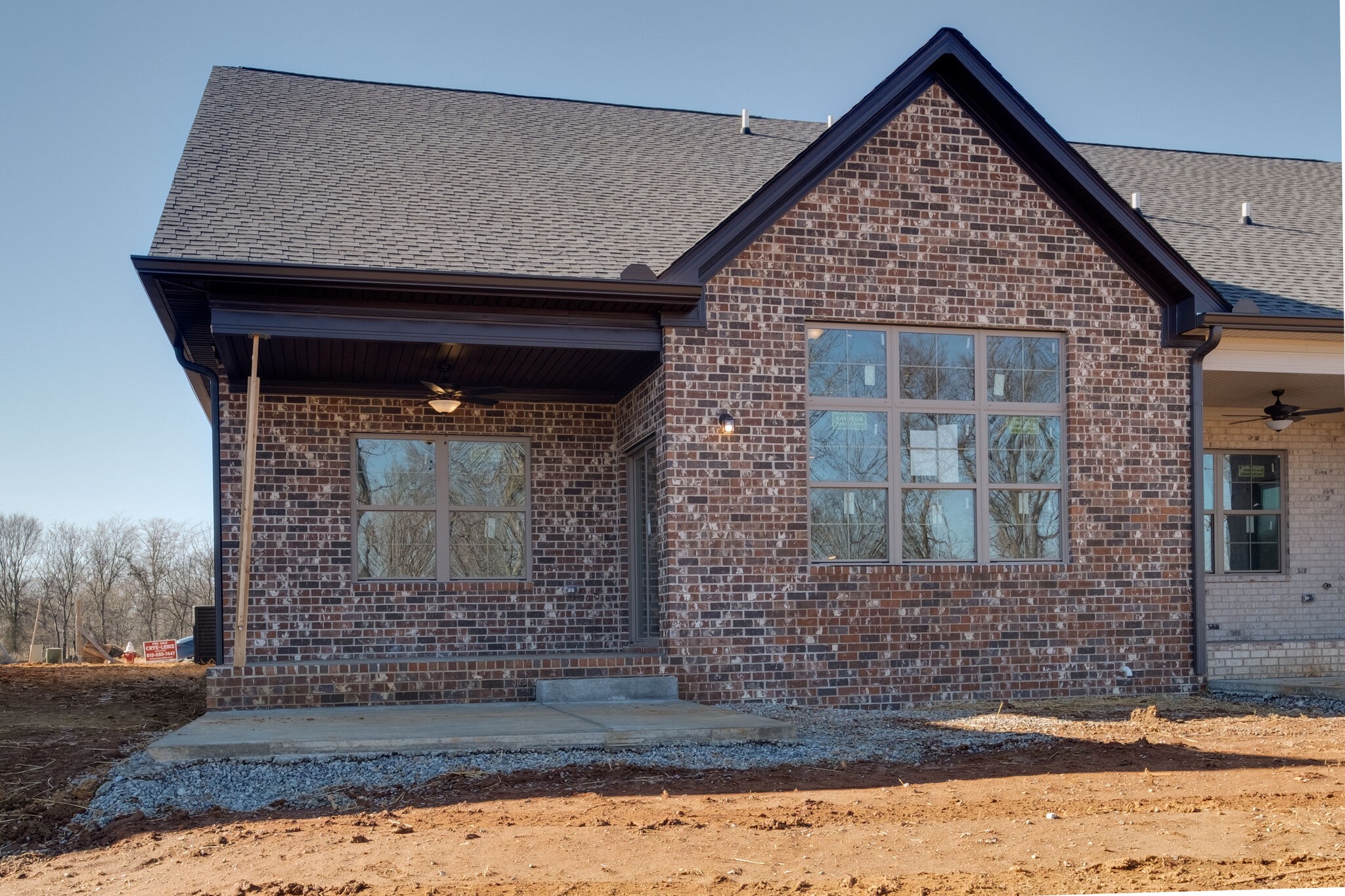 7 The Greens Springfield, TN 37172 - Photo 25 of 29 a front view of a house with garden