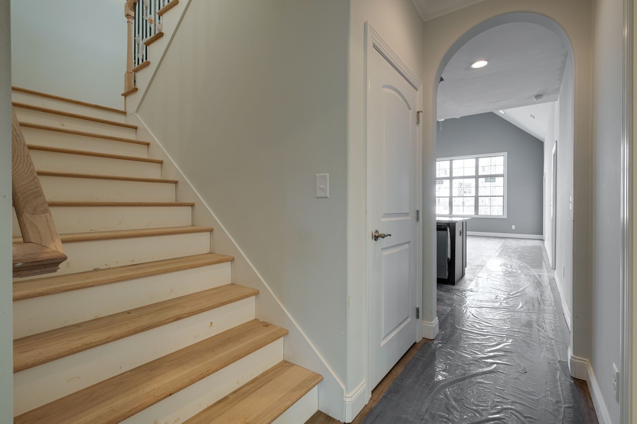 7 The Greens Springfield, TN 37172 - Photo 6 of 29 a view of a hallway with wooden floor and staircase