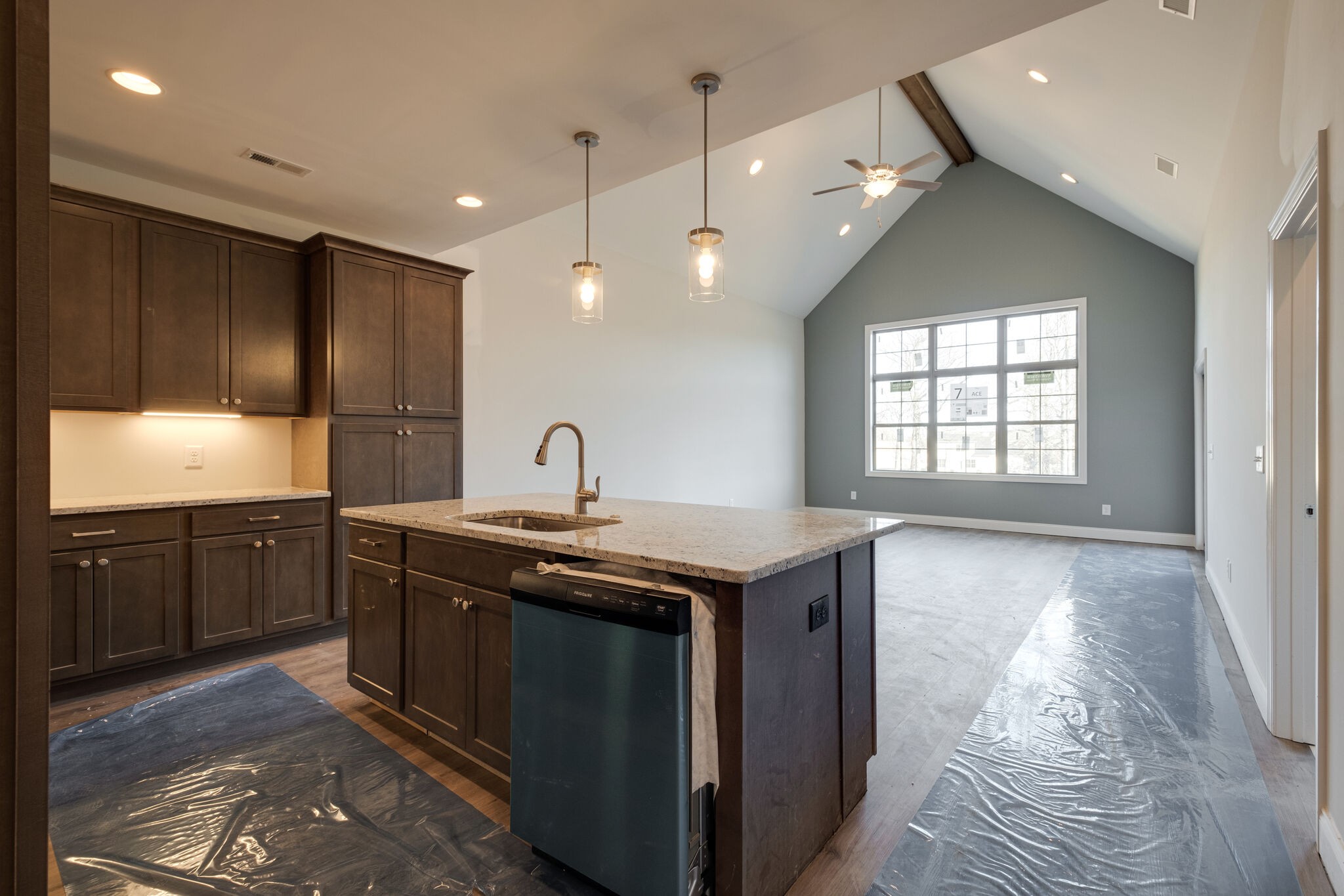 7 The Greens Springfield, TN 37172 - Photo 7 of 29 a kitchen with stainless steel appliances granite countertop a sink a stove and a window